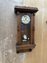 A LATE VICTORIAN 8 DAY WALL CLOCK WITH ROMAN NUMERALS