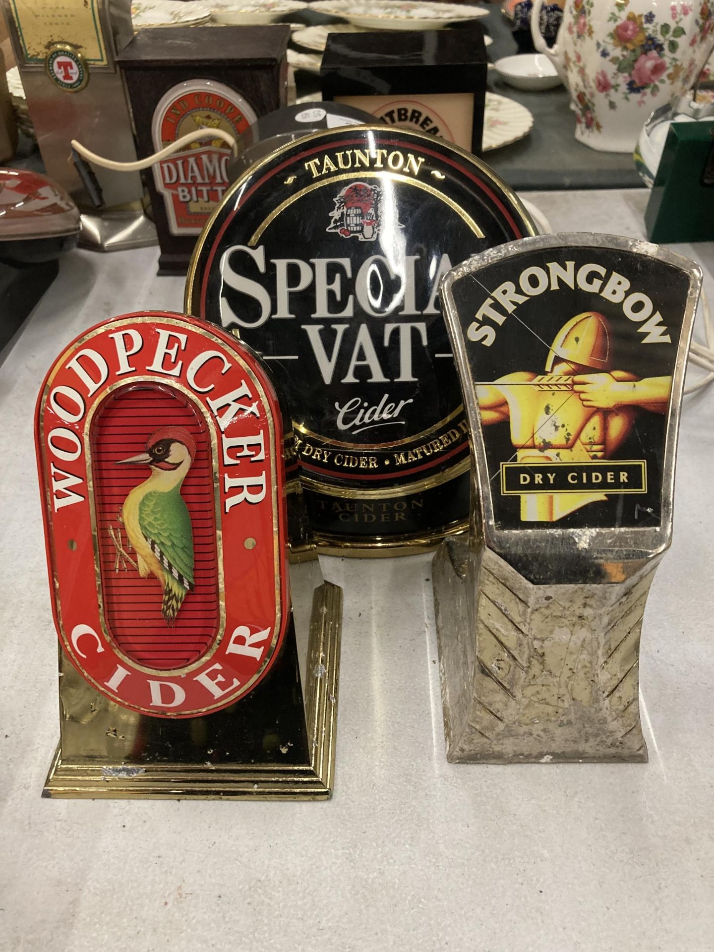 THREE CIDER BAR FONTS TO INCLUDE WOODPECKER, STRONGBOW AND TAUNTON SPECIAL VAT