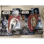 TWO STAR WARS FIGURES, REY AND DIRECTOR KRENNIC, MINT ON CARDS