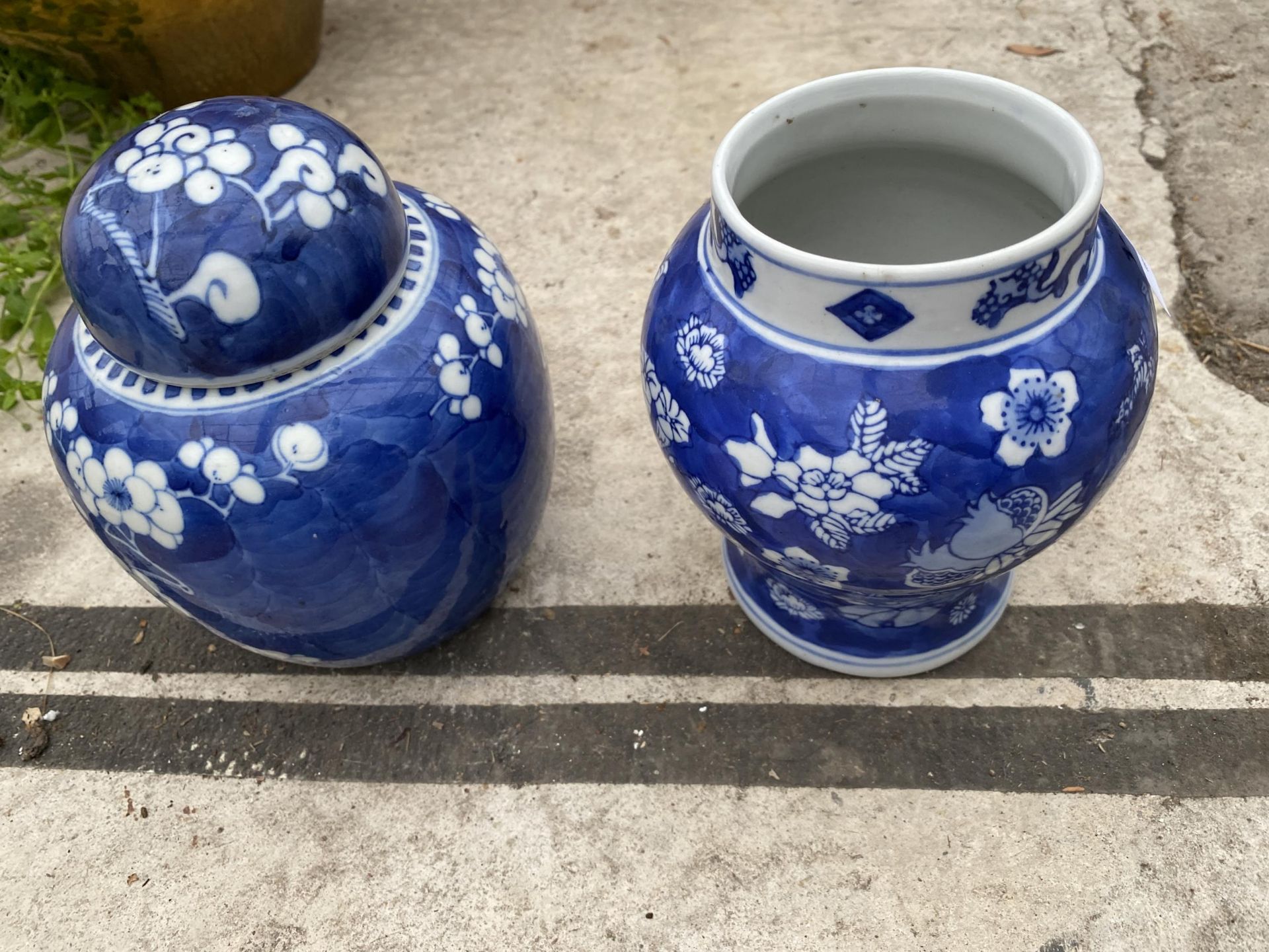 TWO BLUE AND WHITE ORIENTAL PRUNES VASES - Image 2 of 2