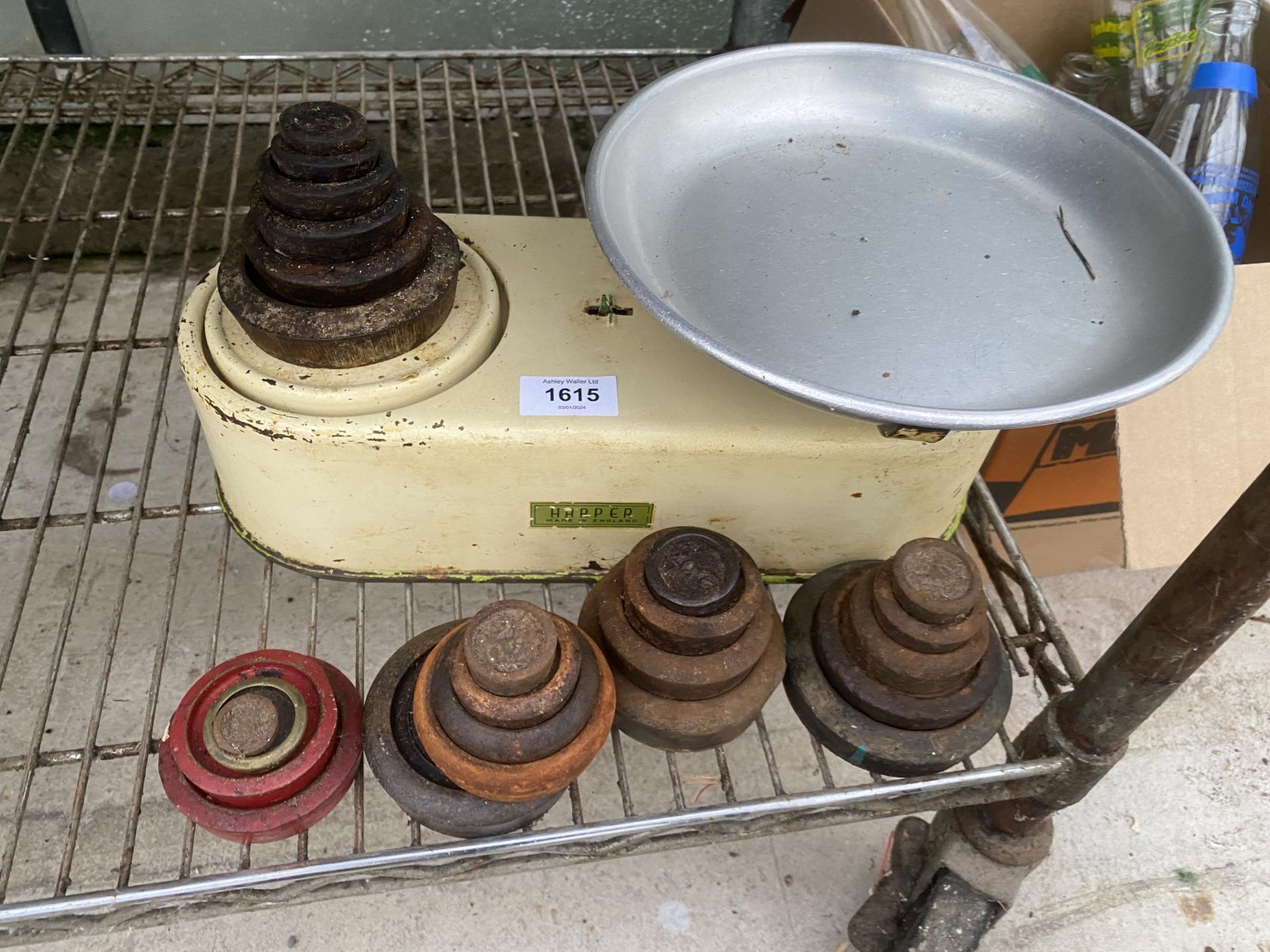 A SET OF VINTAGE HARPER BALANACE SCALES AND AN ASSORTMENT OF VINTAGE CAST IRON WEIGHTS