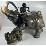 A LARGE 1970S ITALIAN POTTERY SCULPTURE OF AN ELEPHANT BEING ATTACKED BY TIGERS, LENGTH 49 CM