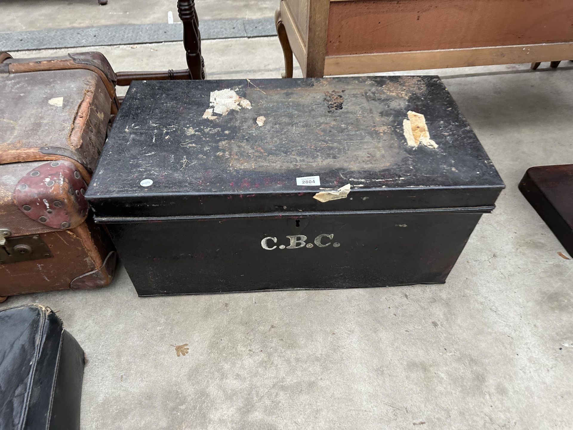 A COMPRESSED FIBRE TRAVELLING TRUNK, ANTLER SUITCASE AND METALWARE DEED BOX - Image 2 of 4