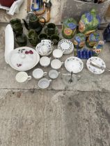 AN ASSORTMENT OF CERAMICS TO INCLUDE RAMEKINS, CUPS AND SAUCERS AND CADDIES ETC
