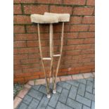 A PAIR OF VINTAGE CHILDS CRUTCHES