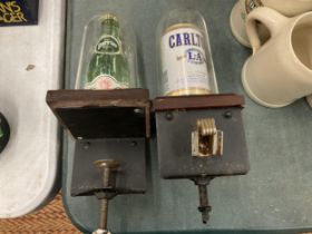 TWO DOMED BAR FONT BOTTLE OPENERS TO INCLUDE PERRIER AND CARLTON LAGER