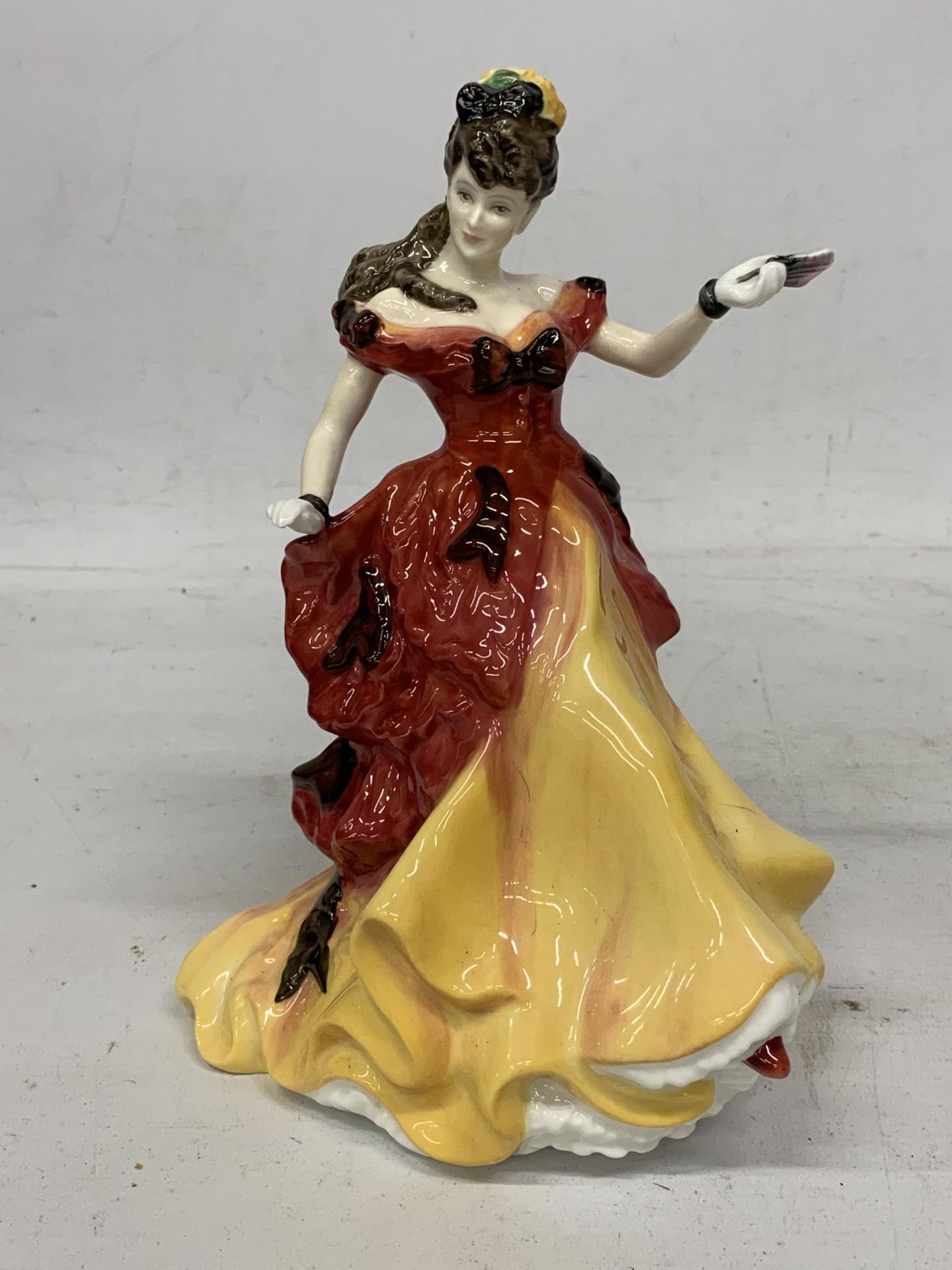A ROYAL DOULTON FIGURE OF THE YEAR 1996 BELLE, HN3703, BONE CHINA LADY FIGURE