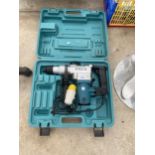 A MAKITA 110V SDS DRILL WITH CARRY CASE