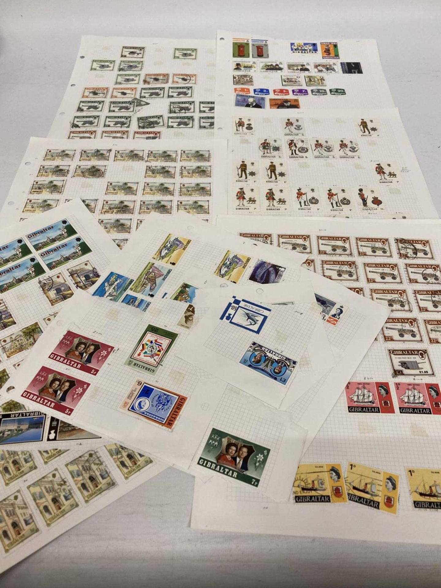 TEN PLUS SHEETS CONTAINING STAMPS FROM GIBRALTA