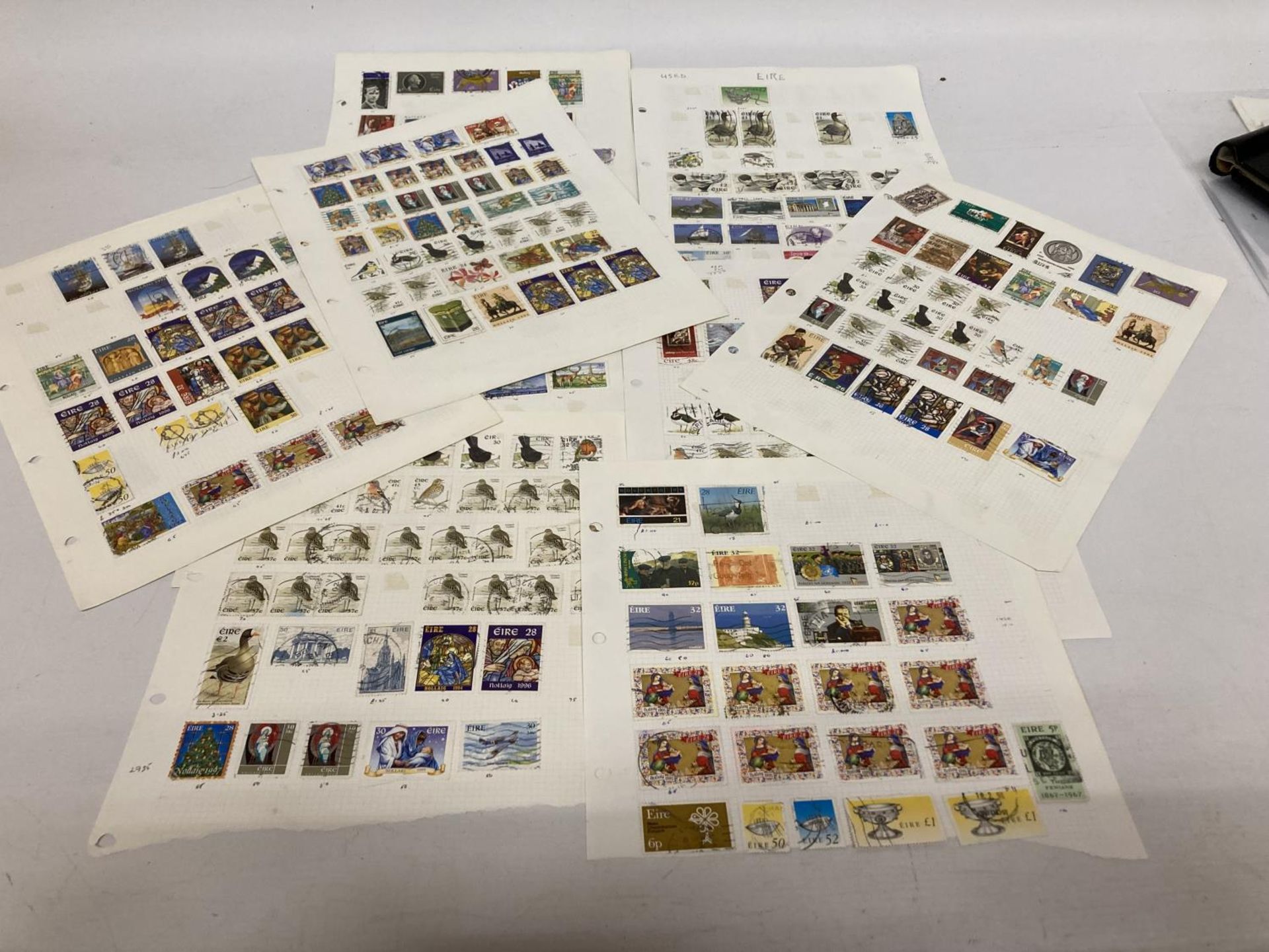 TEN PLUS SHEETS CONTAINING STAMPS FROM IRELAND