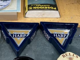 TWO TRIANGULAR HARP LAGER ASHTRAYS