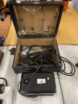 A VINTAGE CASED VIOLET RAY MACHINE