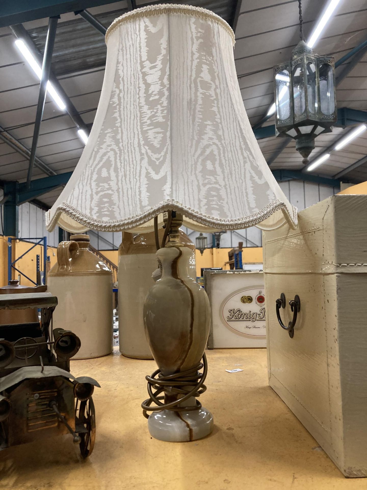 AN ONYX MARBLE TABLE LAMP AND SHADE