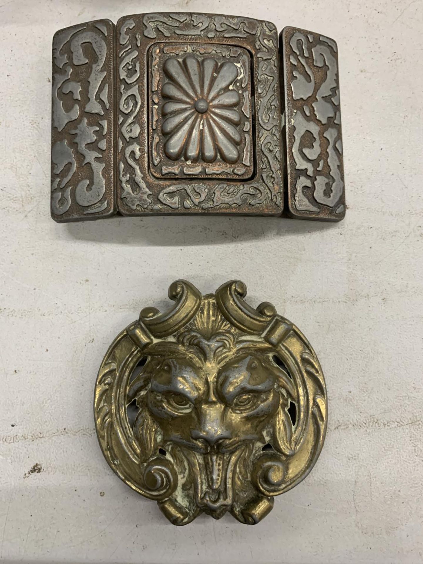 TWO LARGE ORNATE BELT BUCKLES