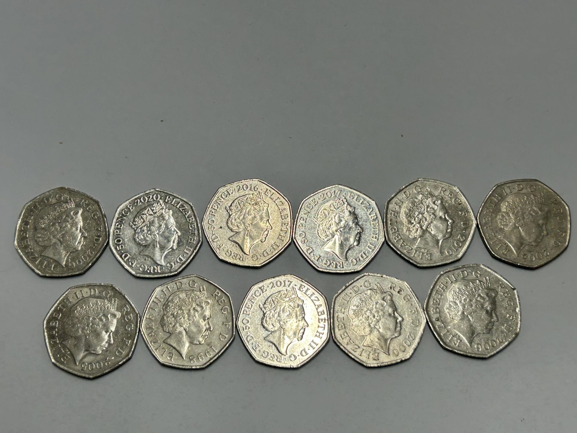 ELEVEN VARIOUS COLLECTABLE FIFTY PENCE PIECES TO INCLUDE, PETER RABBIT, ETC - Image 4 of 4