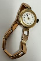 A VINTAGE 9CT YELLOW GOLD LADIES WATCH ON A 9CT ROSE GOLD BRACELET GROSS WEIGHT 26.58 GRAMS