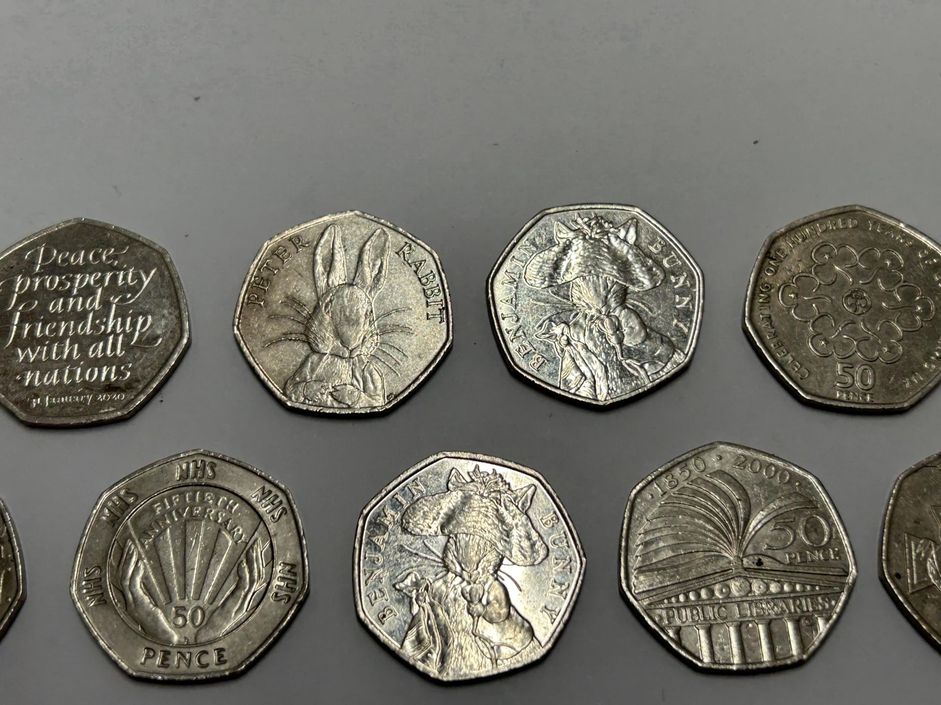 ELEVEN VARIOUS COLLECTABLE FIFTY PENCE PIECES TO INCLUDE, PETER RABBIT, ETC - Image 3 of 4