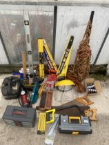 AN ASSORTMENT OF TOOLS TO INCLUDE A BLACK AND DECKER ELECTRIC CHAINSAW BODY, SPIRIT LEVELS AND A