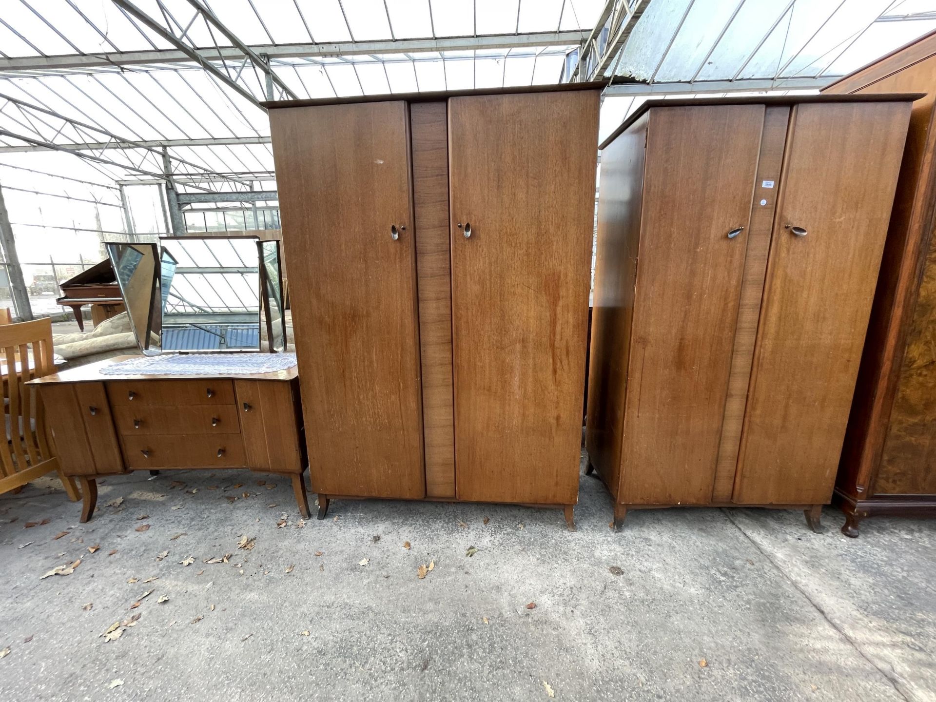 A BRYANTS SAPPHIRE RANGE BEDROOM SUITE COMPRISING TWO WARDROBES AND A DRESSING TABLE