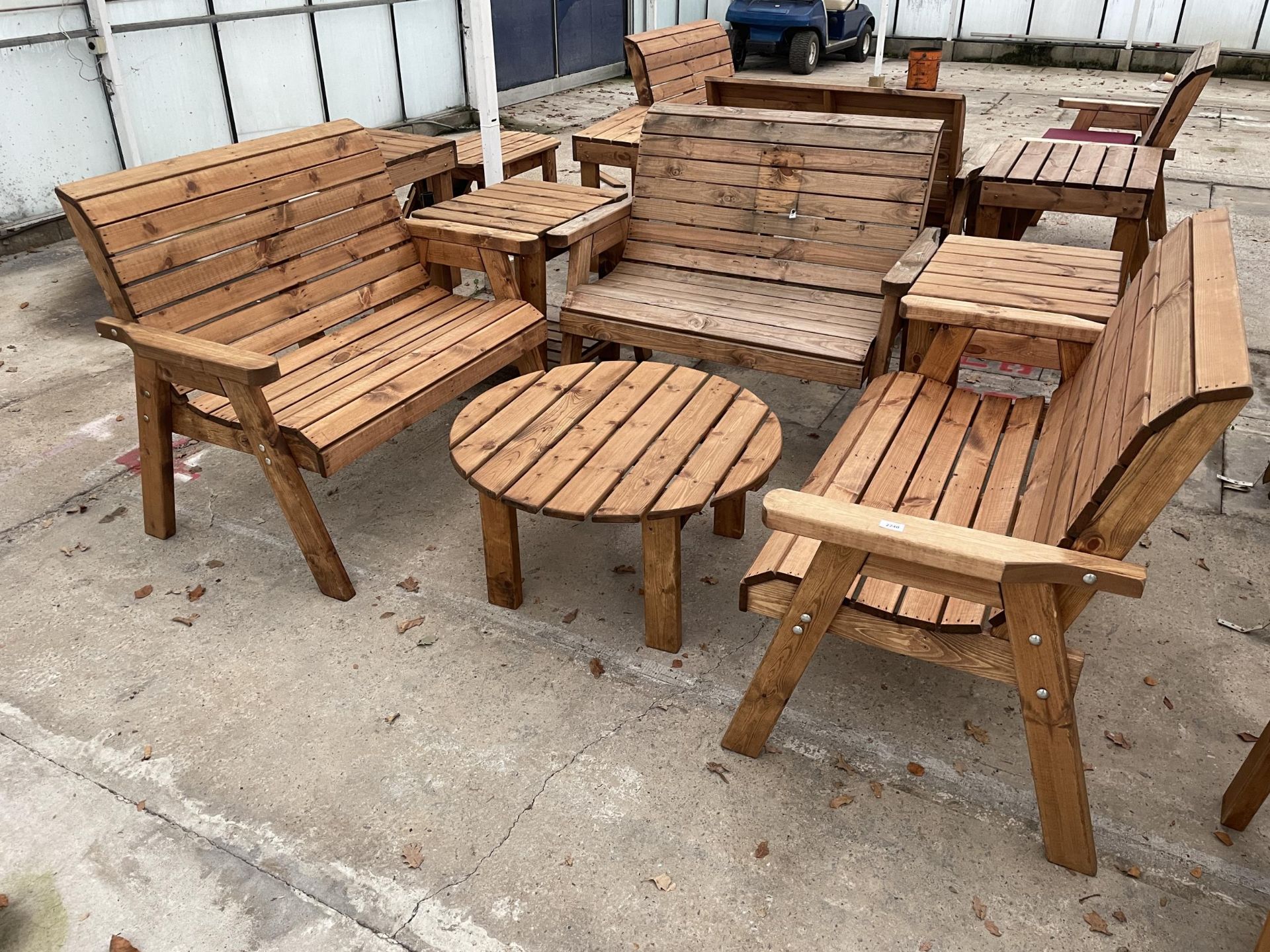 AN AS NEW EX DISPLAY CHARLES TAYLOR PATIO SET COMPRISING OF THREE TWO SEATER BENCHES, TWO SIDE