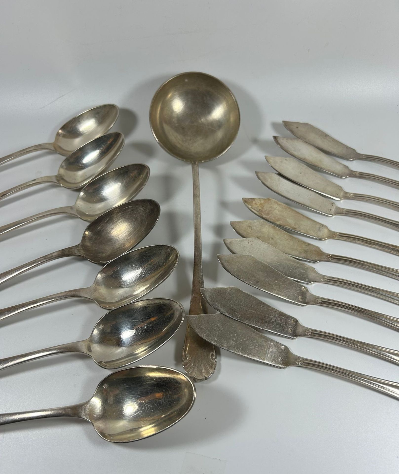 A COLLECTION OF ART DECO CHRISTOFLE SILVER PLATED CUTLERY COMPRISING SPOONS AND A LARGE LADLE IN THE - Image 2 of 7