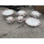 AN ASSORTMENT OF CERAMIC DINNER SERVICE ITEMS TO INCLUDE TUREENS AND PLATES ETC