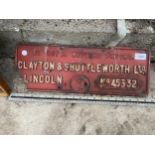 A RECTANGULAR CAST METAL 'CLAYTON & SHUTTLEWORTH LTD' SIGN