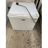 A WHITE FRIDGEMASTER COUNTER TOP FREEZER