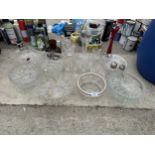 AN ASSORTMENT OF GLASS WARE TO INCLUDE VASES AND BOWLS ETC