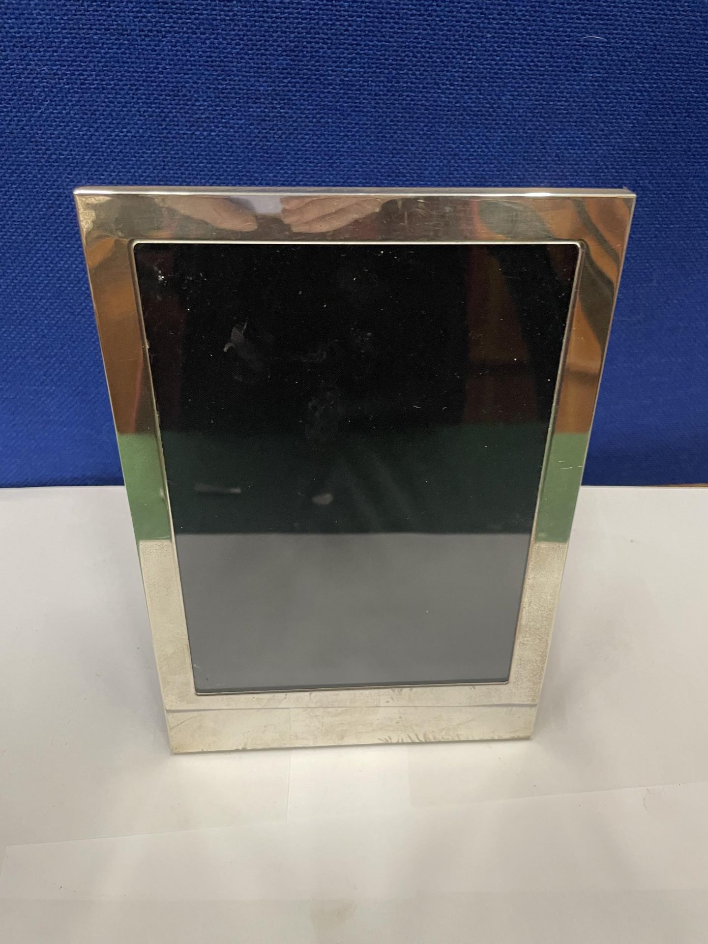 A MARKED 925 SILVER PHOTOGRAPH FRAME