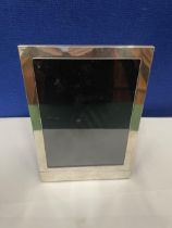 A MARKED 925 SILVER PHOTOGRAPH FRAME