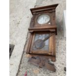 AN OAK CHIMING WALL CLOCK FOR RESTORATION