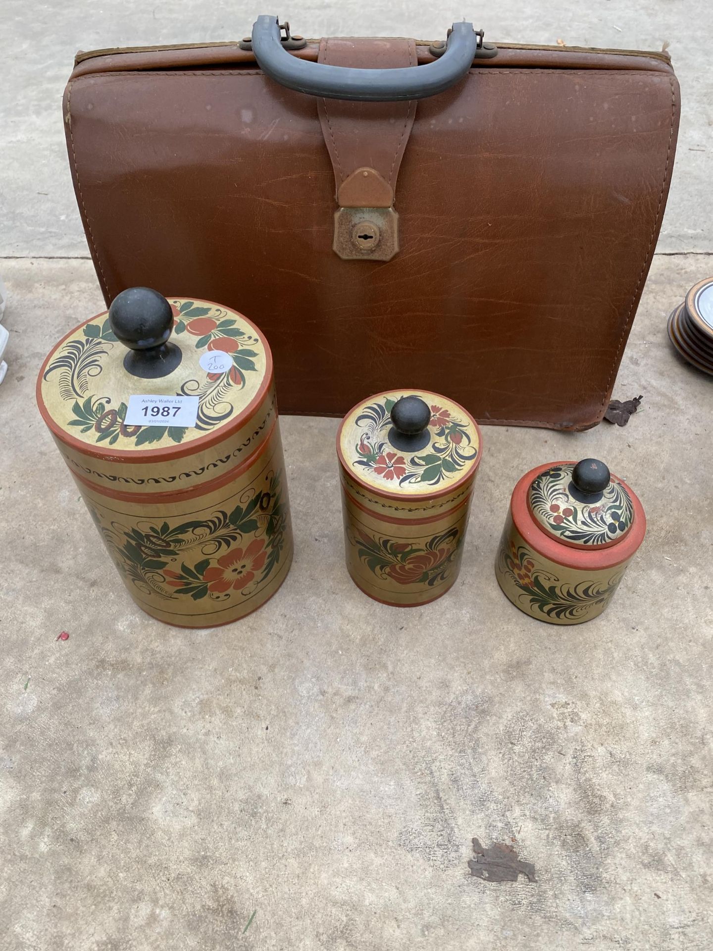 A VINTAGE LEATHER DOCTORS CASE AND THREE GRADUATED STORAGE POTS ETC