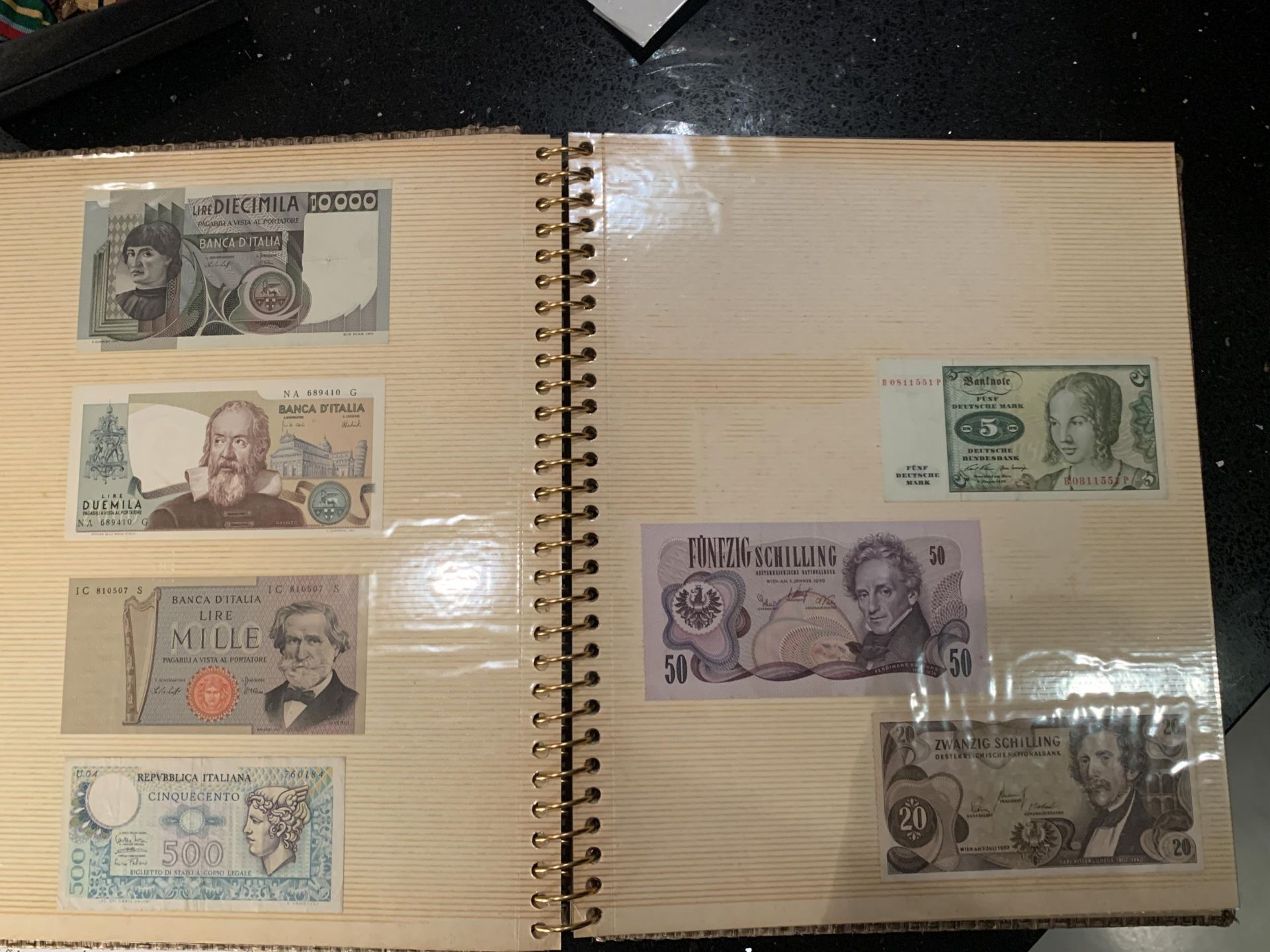 BINDER OF BANKNOTES TO INCLUDE : GERMANY 1970 5DM , AUSTRIA 1962 20SCH , 1970 50 SCH , PORTUGAL 1964