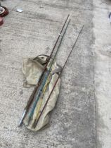 A VINTAGE FISHING ROD WITH CARRY BAG