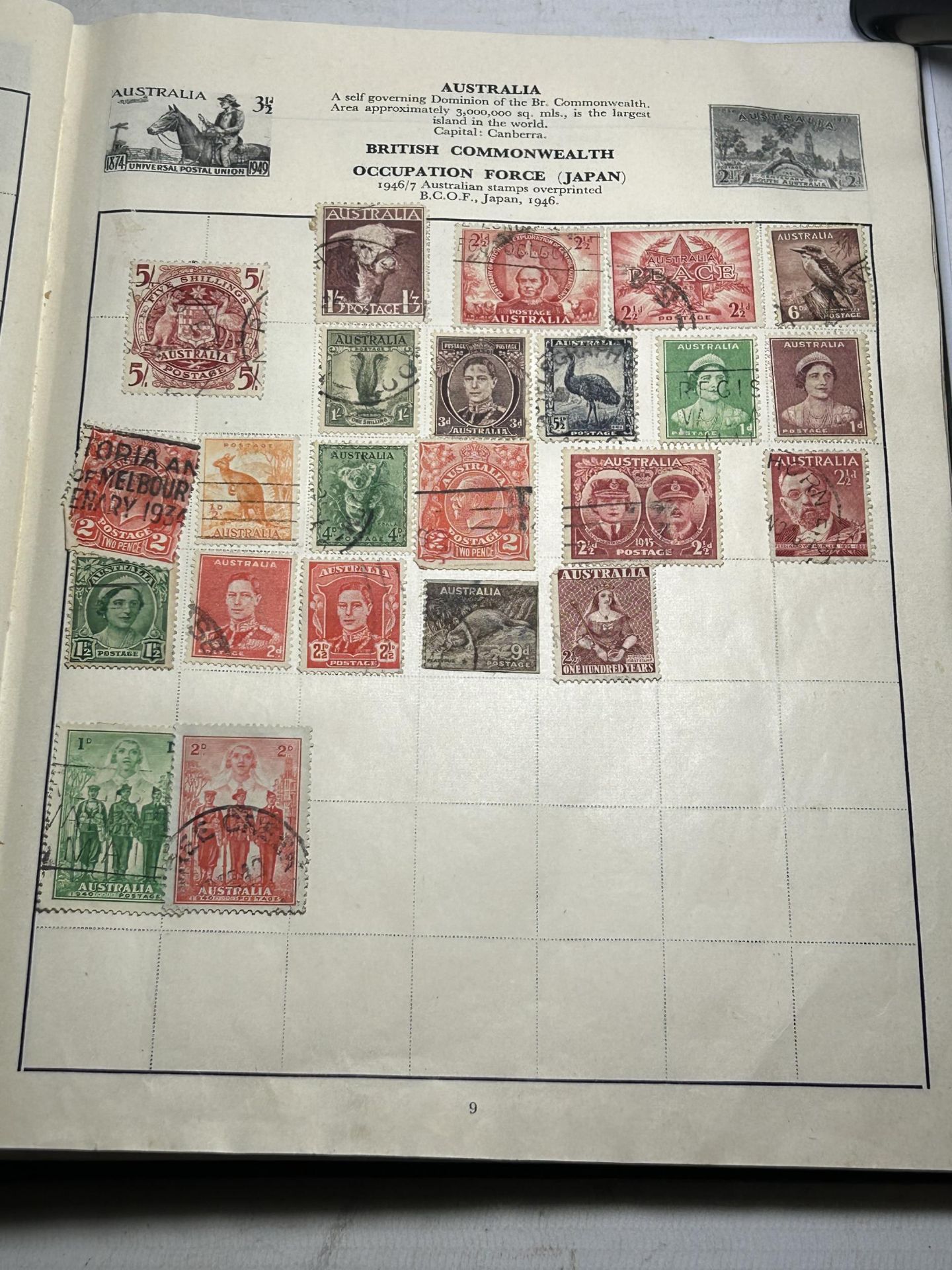A CAVALIER STAMP ALBUM CONTAINING A COLLECTION OF VARIOUS WORLD STAMPS