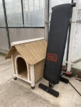 A PRO POWER GYM BENCH AND A WOODEN DOG KENNEL