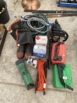 AN ASSORTMENT OF ITEMS TO INCLUDE A TITAN PETROL CHAINSAW, TWO PETROL CANS AND WELLIES ETC