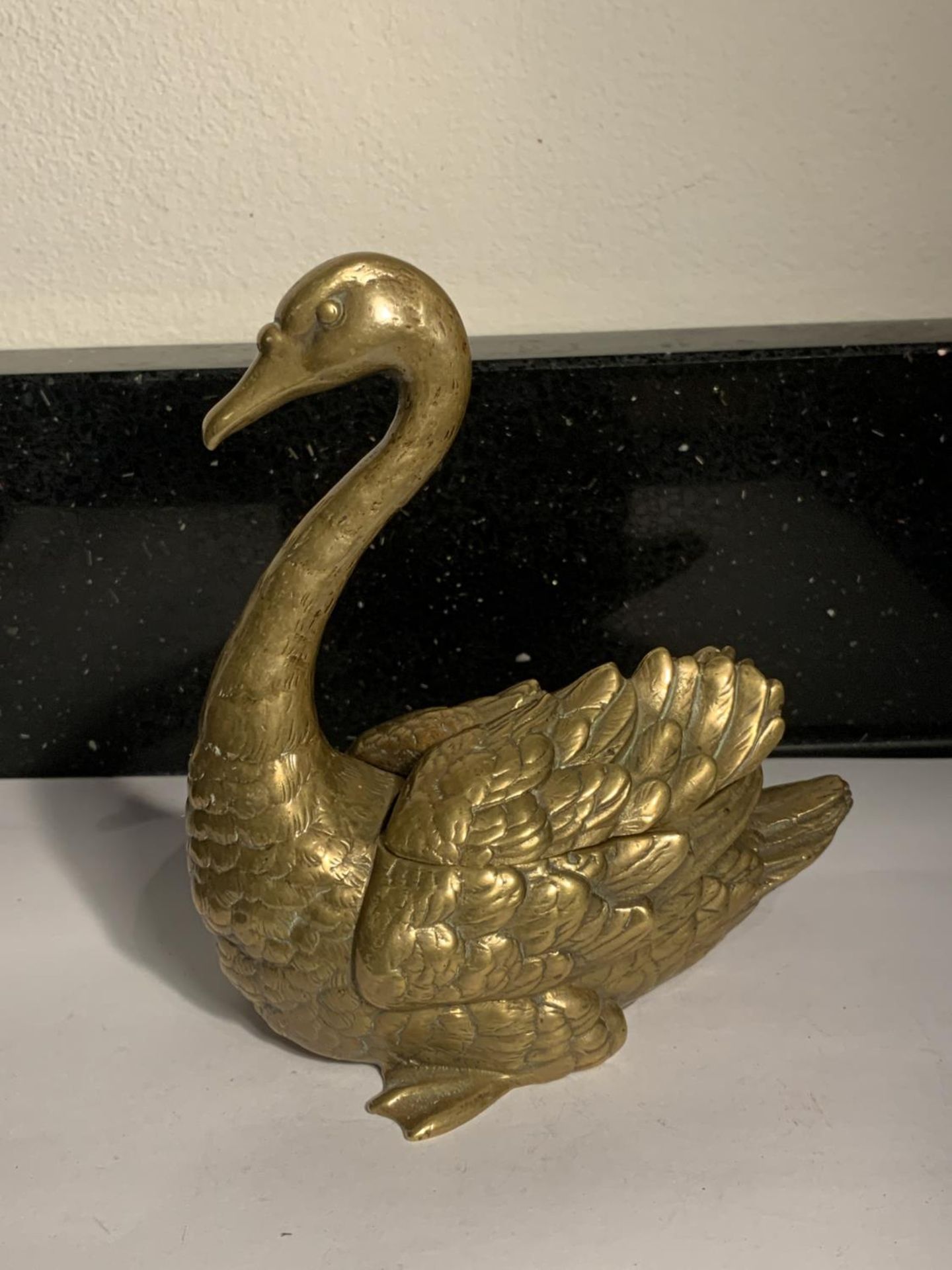 A GERMAN BRASS INKWELL GESCHUTZTN 1101 IN THE STYLE OF A SWAN