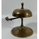 A VINTAGE BRASS HOTEL RECPEPTION COUNTER BELL WITH TWIST COLUMN DESIGN
