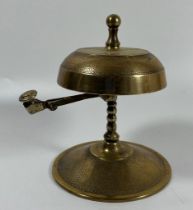 A VINTAGE BRASS HOTEL RECPEPTION COUNTER BELL WITH TWIST COLUMN DESIGN