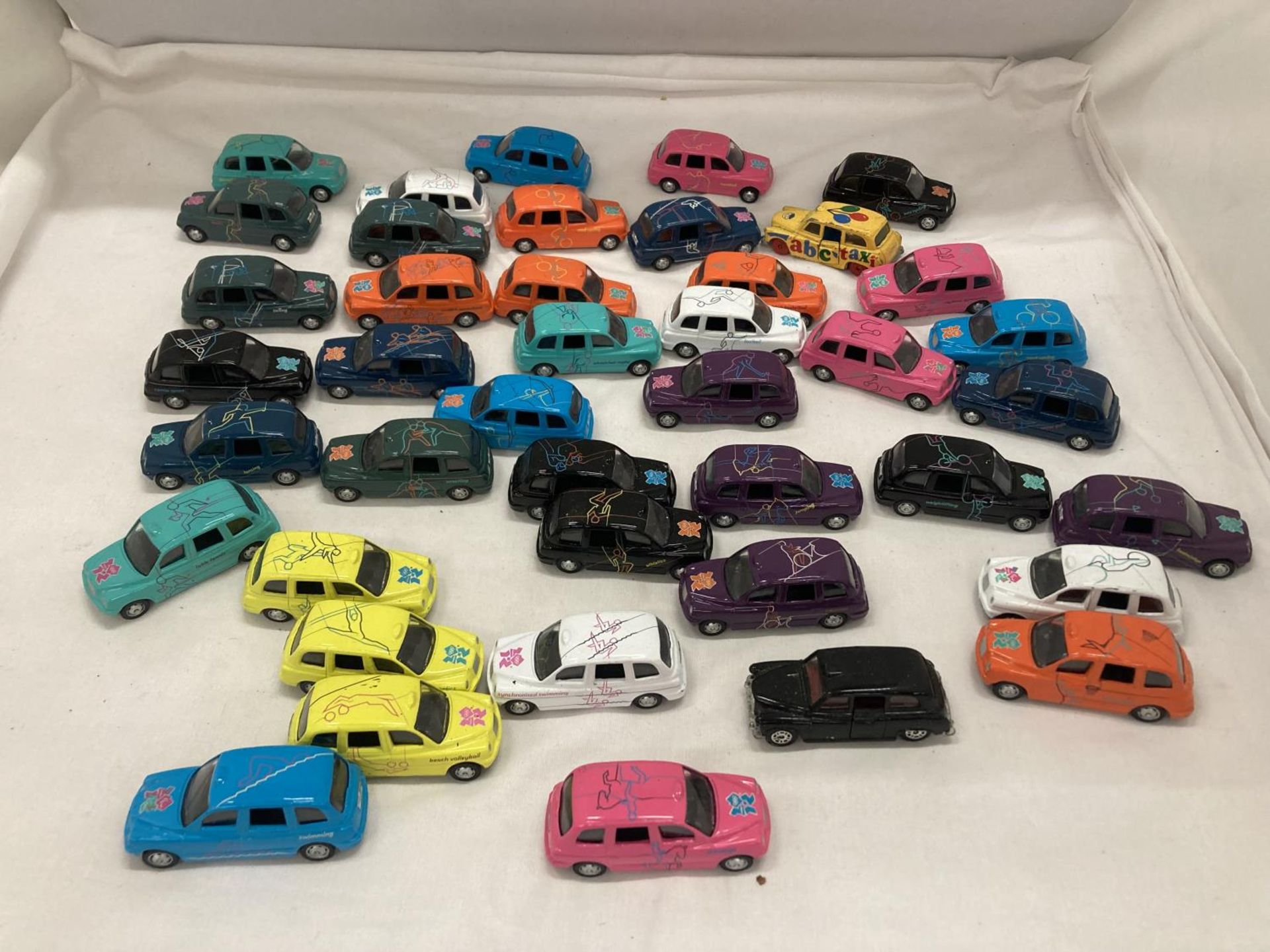 A LARGE QUANTITY OF CORGI DIE-CAST TAXIS