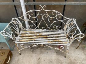 A VINTAGE WROUGHT IRON AND SLATTED GARDEN BENCH