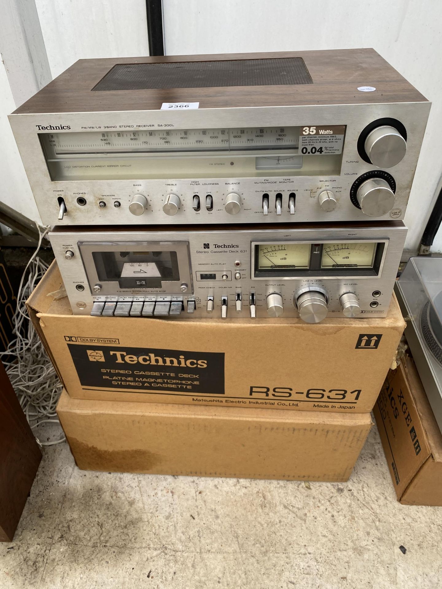 A TECHNICS STEREO CASSETTE DECK AND A TECHNICS STEREO RECIEVER BOTH WITH BOXES