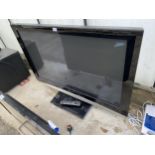 A PANASONIC 46" TELEVISION WITH REMOTE CONTROL