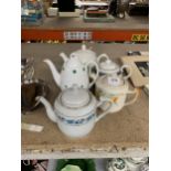 A GROUP OF FIVE TEAPOTS