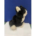 A VINTAGE STEIFF BLACK AND WHITE CAT WITH EAR TAG BUTTON