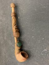 A VINTAGE HANDMADE TRIBAL WOODEN PIPE