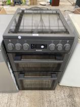 A BLACK BLOMBERG FREESTANDING ELECTRIC OVEN AND HOB