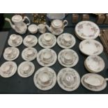 A LARGE QUANTITY OF ROYAL ALBERT 'CONSTANCE' TO INCLUDE A TEAPOT AND COFFEE POT, SIX COFFEE CUPS AND